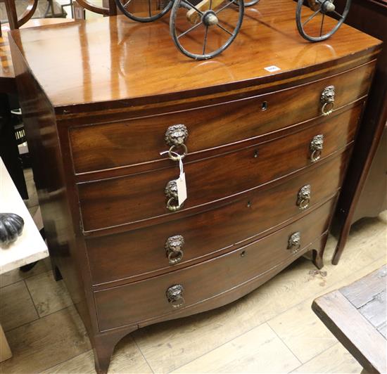 A Regency mahogany bow-fronted chest fitted four graduated long drawers W.89cm